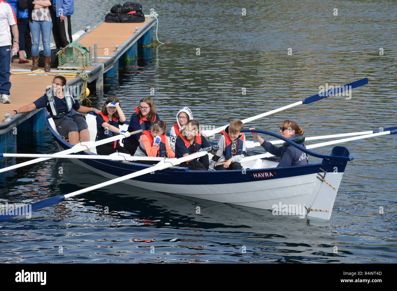 Shetland rowing regatta being held in Hamnavoe Burra in the Shetland Islands during the summer. Local teams race for each district Stock Photo