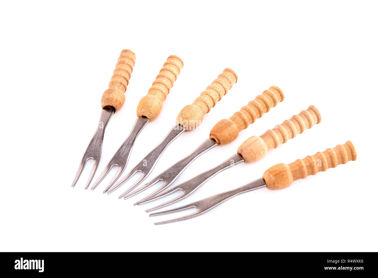 Forks with wooden handles isolated on white background Stock Photo Alamy