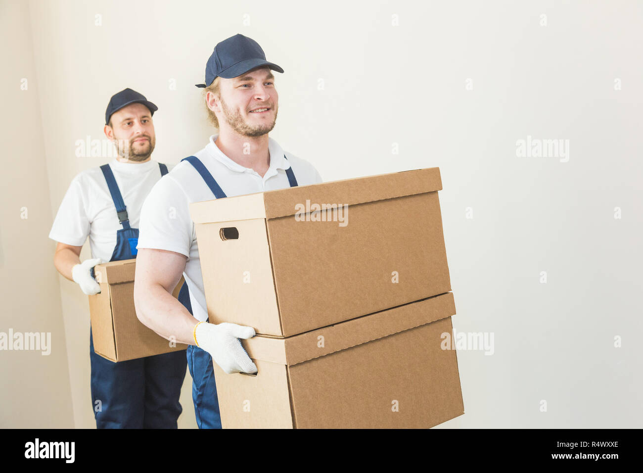 Two loaders unloading hi-res stock photography and images - Alamy