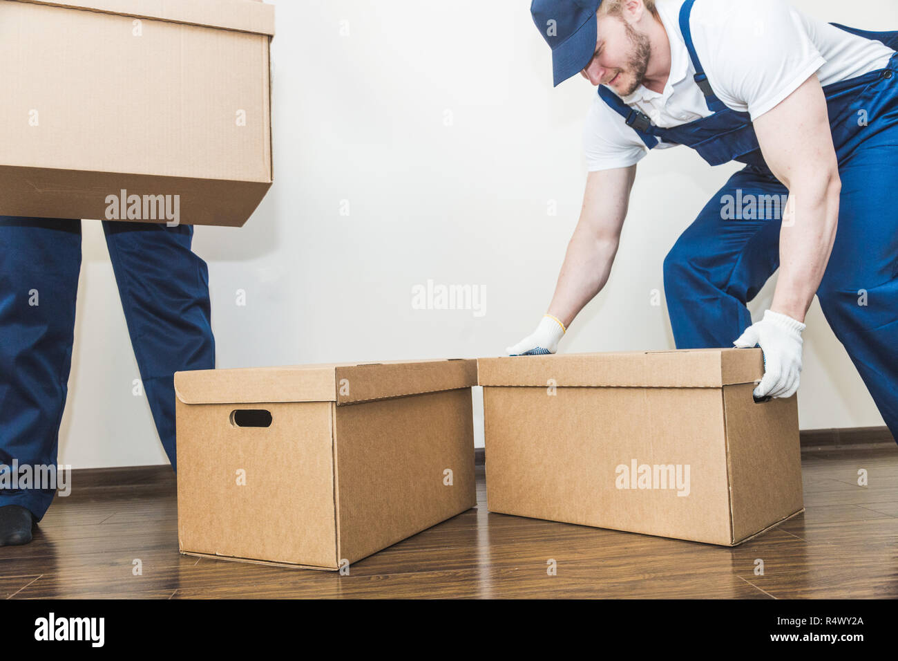 Two loaders unloading hi-res stock photography and images - Alamy