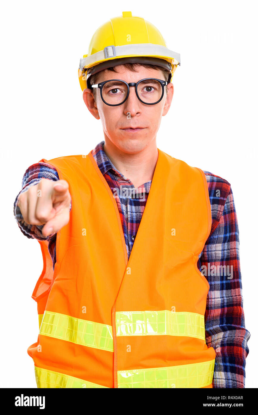 Studio shot of man construction worker pointing finger at camera Stock Photo