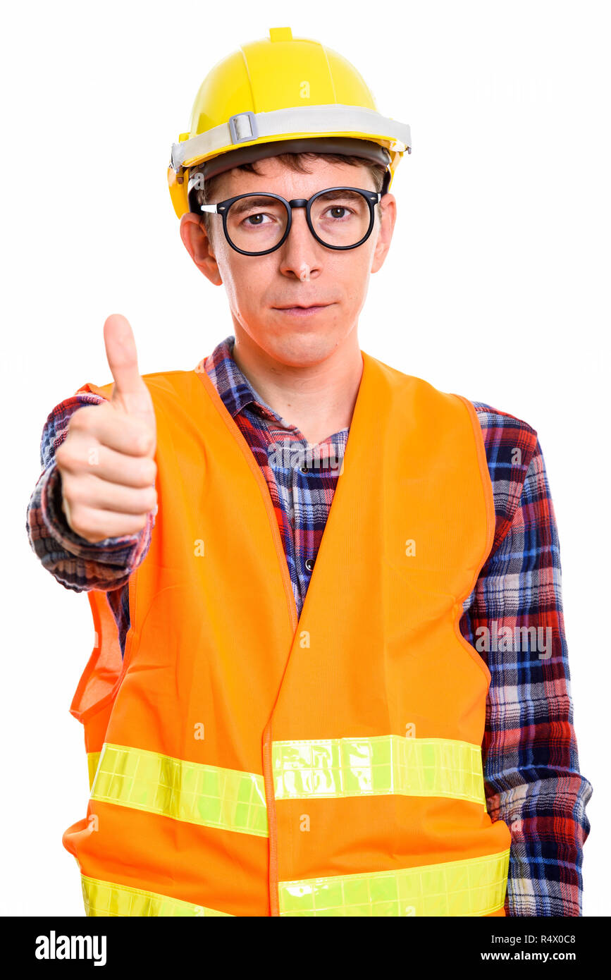 Studio shot of man construction worker giving thumb up Stock Photo Alamy