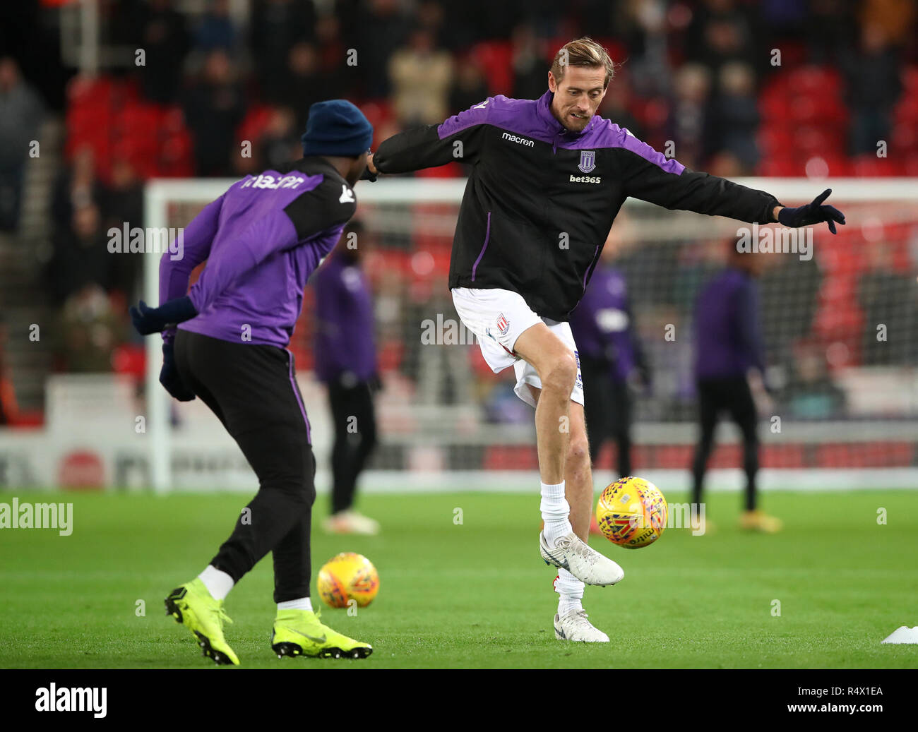 Stoke City's Peter Crouch warms up before the Sky Bet Championship match at the bet365 Stadium, Stoke. PRESS ASSOCIATION Photo. Picture date: Wednesday November 28, 2018. See PA story SOCCER Stoke. Photo credit should read: Tim Goode/PA Wire. RESTRICTIONS: No use with unauthorised audio, video, data, fixture lists, club/league logos or 'live' services. Online in-match use limited to 120 images, no video emulation. No use in betting, games or single club/league/player publications. Stock Photo