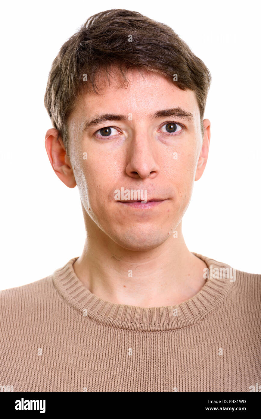 Portrait of man looking at camera in studio Stock Photo