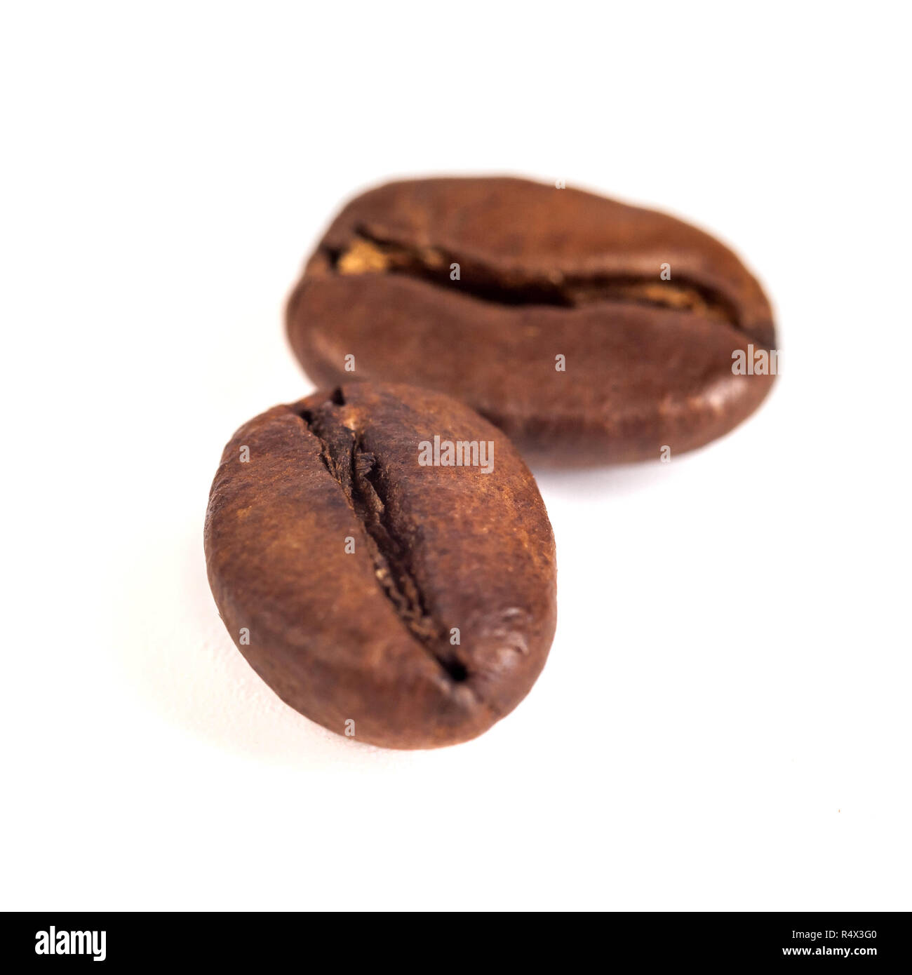 roasted coffee beans isolated on white background Stock Photo - Alamy