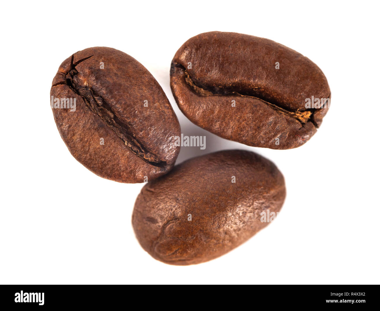 roasted coffee beans isolated on white background Stock Photo - Alamy