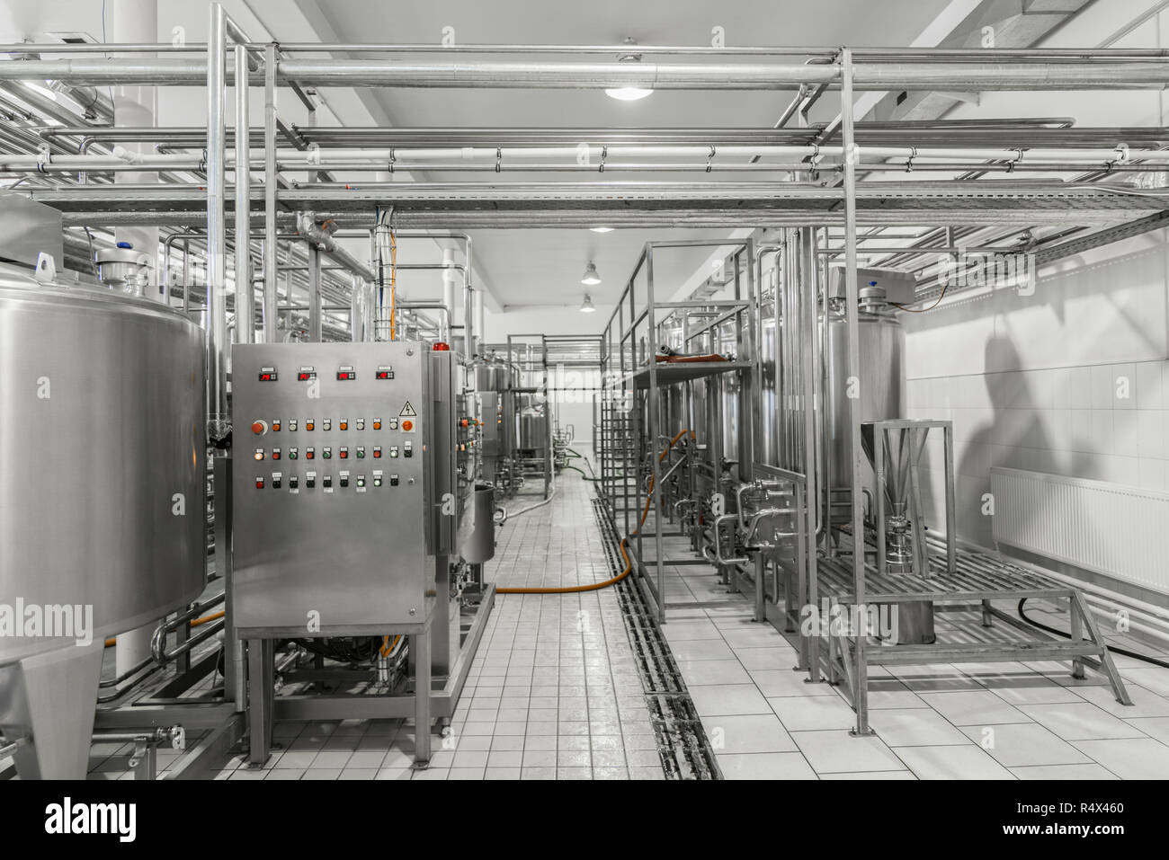 general view of the interior of a milk factory. equipment at the dairy plant Stock Photo