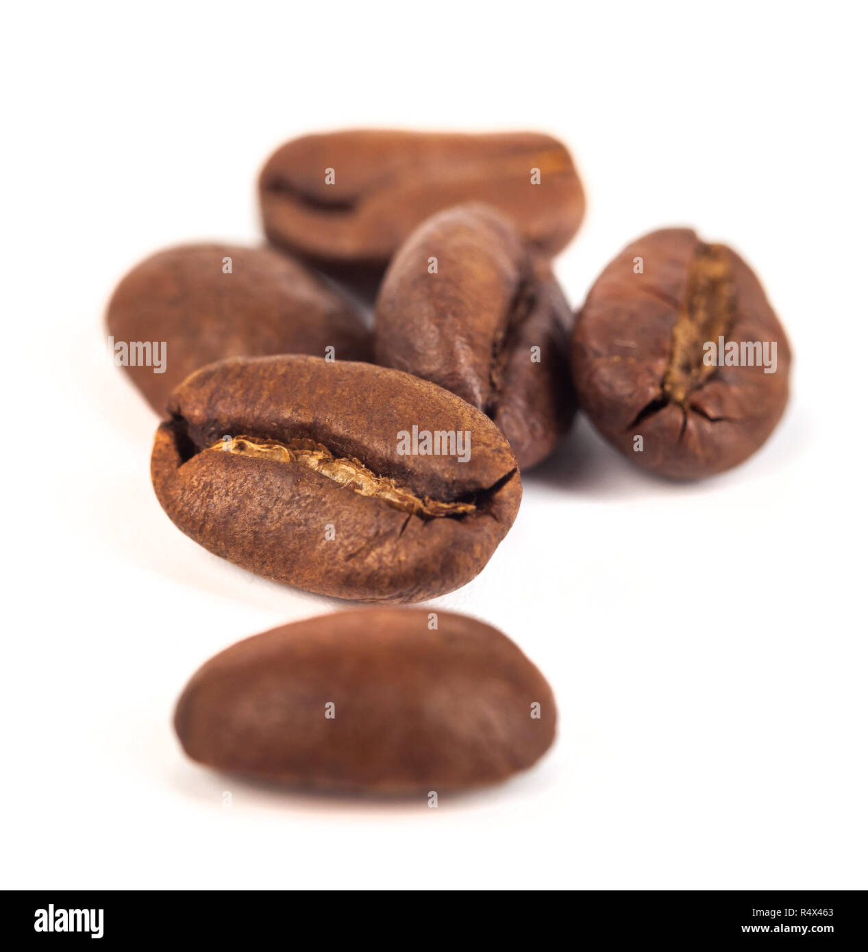 roasted coffee beans isolated on white background Stock Photo - Alamy