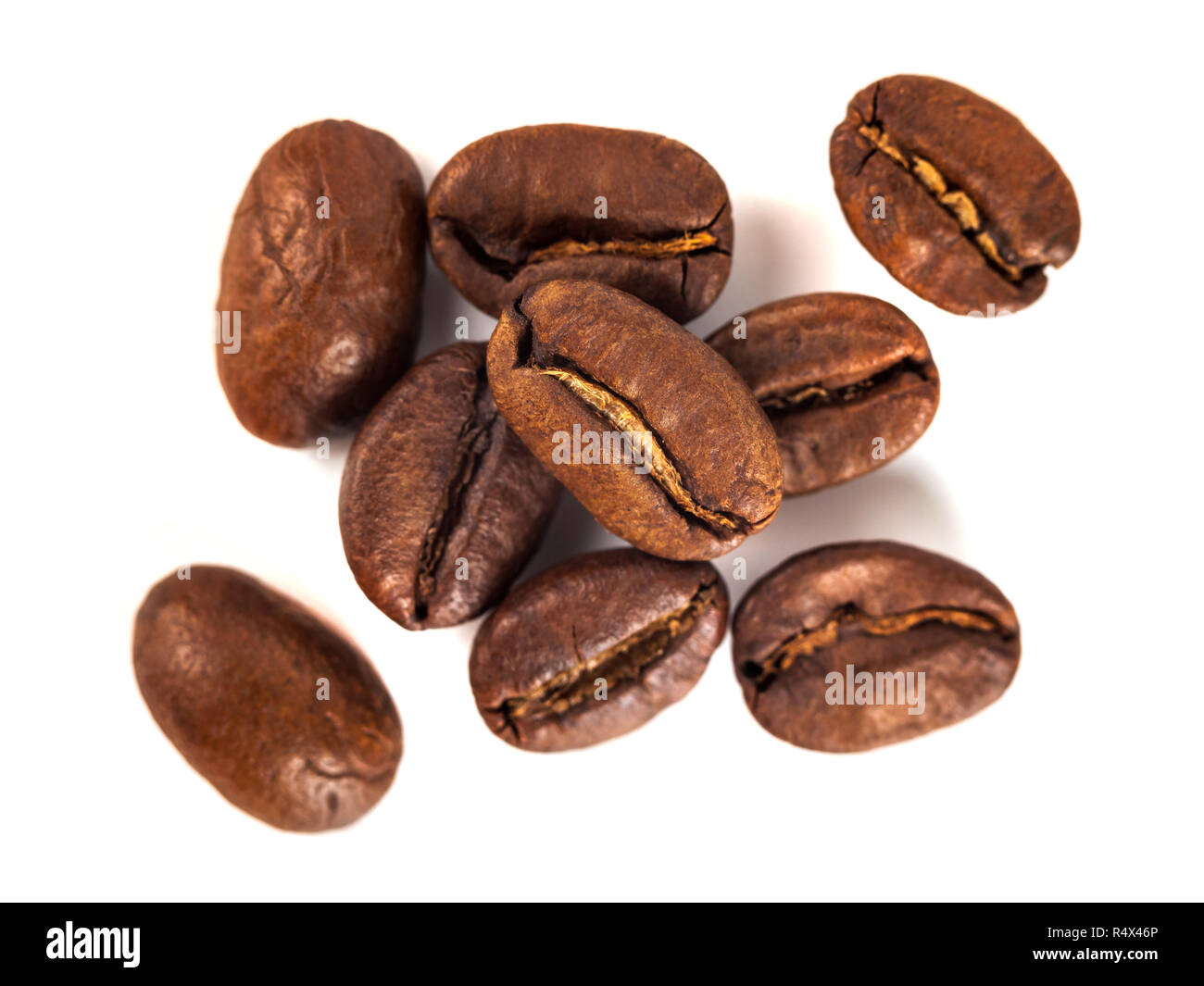 roasted coffee beans isolated on white background Stock Photo - Alamy