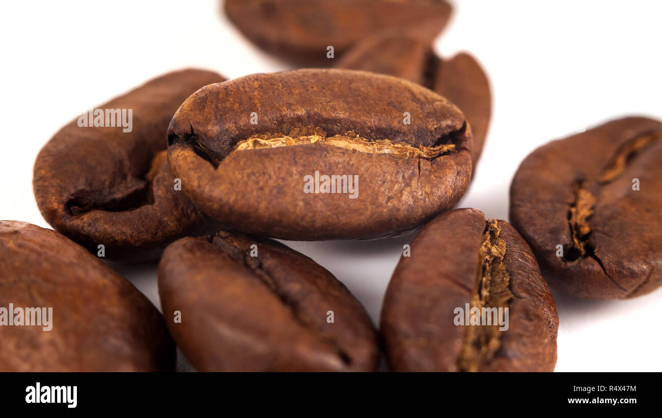 roasted coffee beans isolated on white background Stock Photo - Alamy