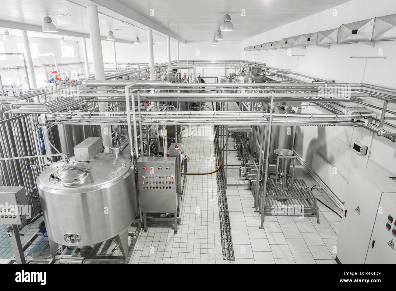 general view of the interior of a milk factory. equipment at the dairy  plant Stock Photo - Alamy