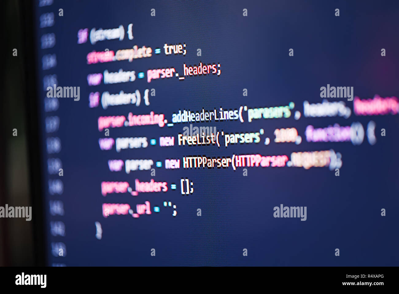 Colorful programming code on a computer monitor screen Stock Photo - Alamy