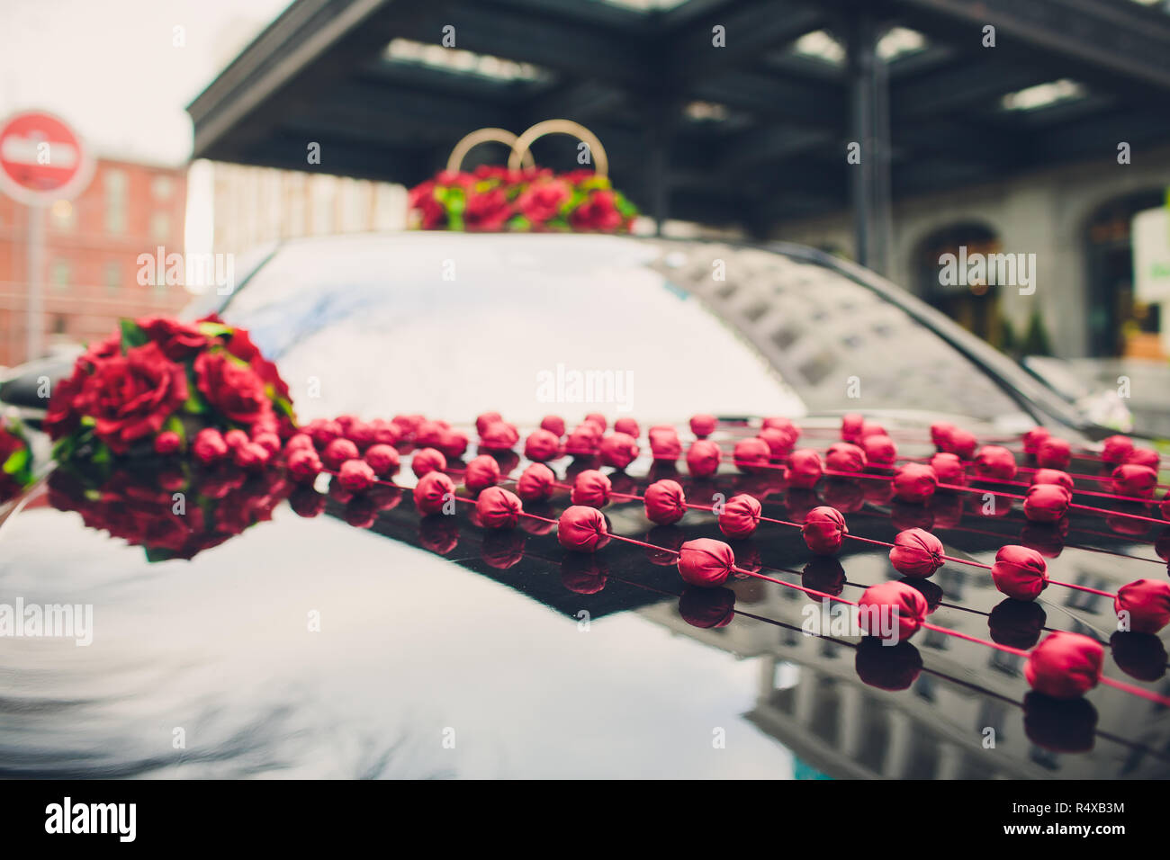 Beautiful flowers decoration on wedding car with lake background