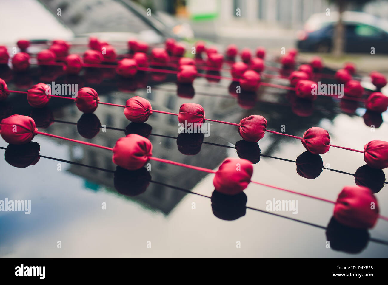 Beautiful flowers decoration on wedding car with lake background