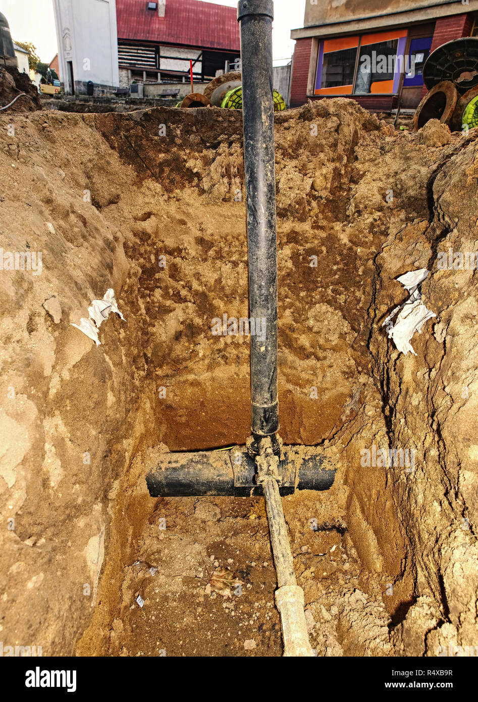 Installing new water pipes in old town street, maintenance work, dig