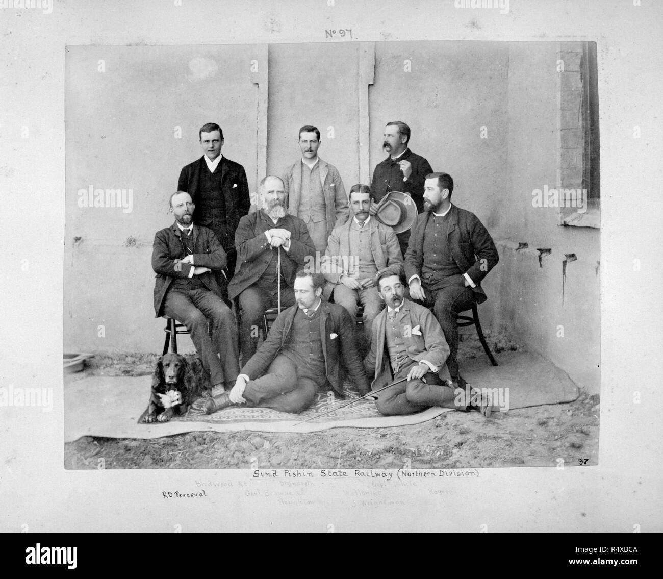 Portrait photograph of a group of engineers. Northern Scind Pishin State Railway. 19th century Balochistan.  All named: 'Birdwood, RE; Brandreth; Capt White, RE; R.D. Perceval; Genl [James] Browne, RE; Walton, RE; Rogers; Houghton; W.J. Weightman'. [Group of engineers]. Northern Scind Pishin State Rly. Balochistan; Pakistan; Quetta; 1887. Portraits: Birdwood, Herbert Christopher Impey. Captain Brandreth. Browne, James. General Houghton. Perceval, Richard Douglas. Rogers. Walton, Ellys William. Captain Weightman, Walter James. White, Charles Fitzwilliam. Source: Photo 481/1/.(9). Author: ANON. Stock Photo