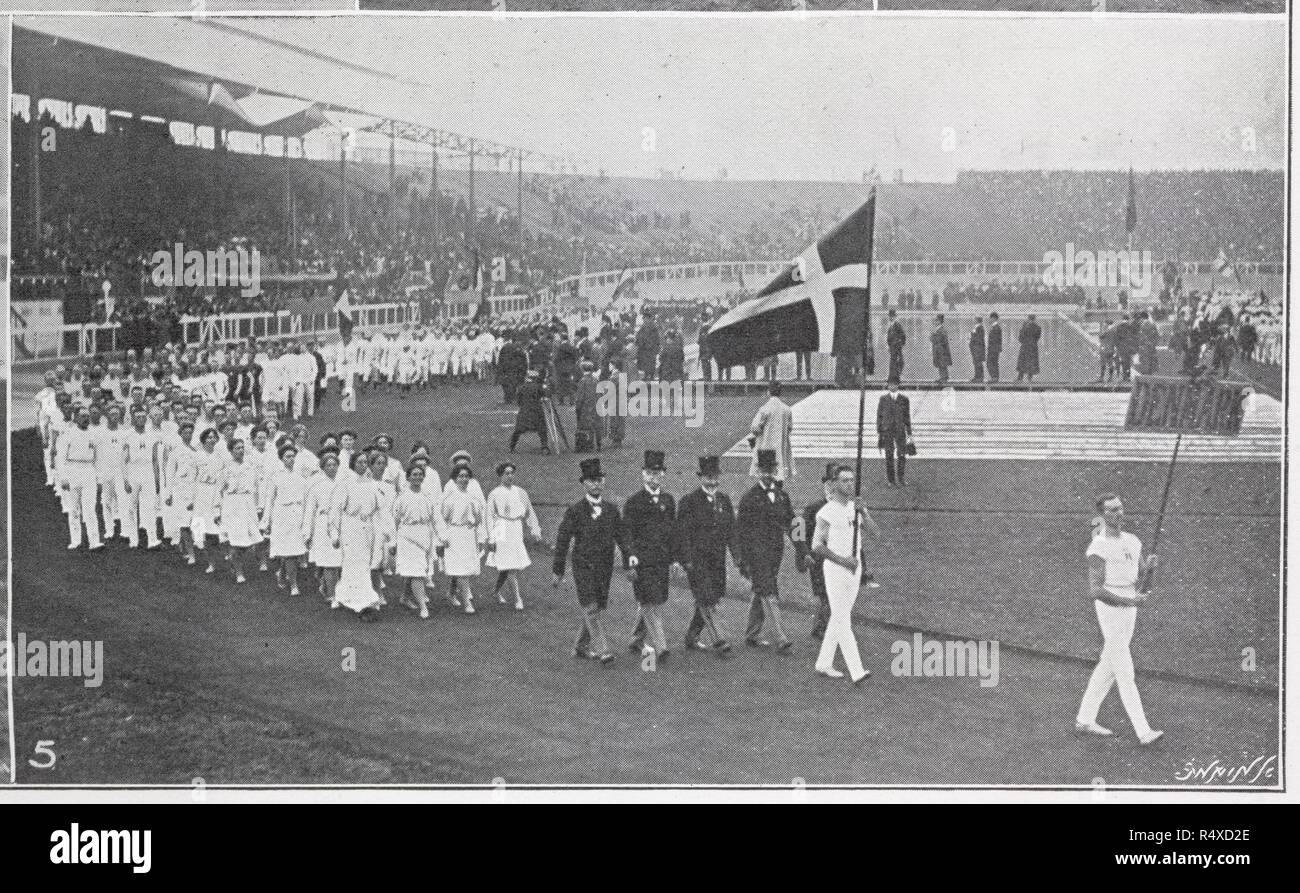 Parade of athletes in the stadium. - Danish section. Illustrated Sporting & Dramatic News. 18th July 1908. Photograph from a newspaper on the 1908 Olympic Games in London. Source: Illustrated Sporting & Dramatic News, page 803 detail. Language: English. Stock Photo