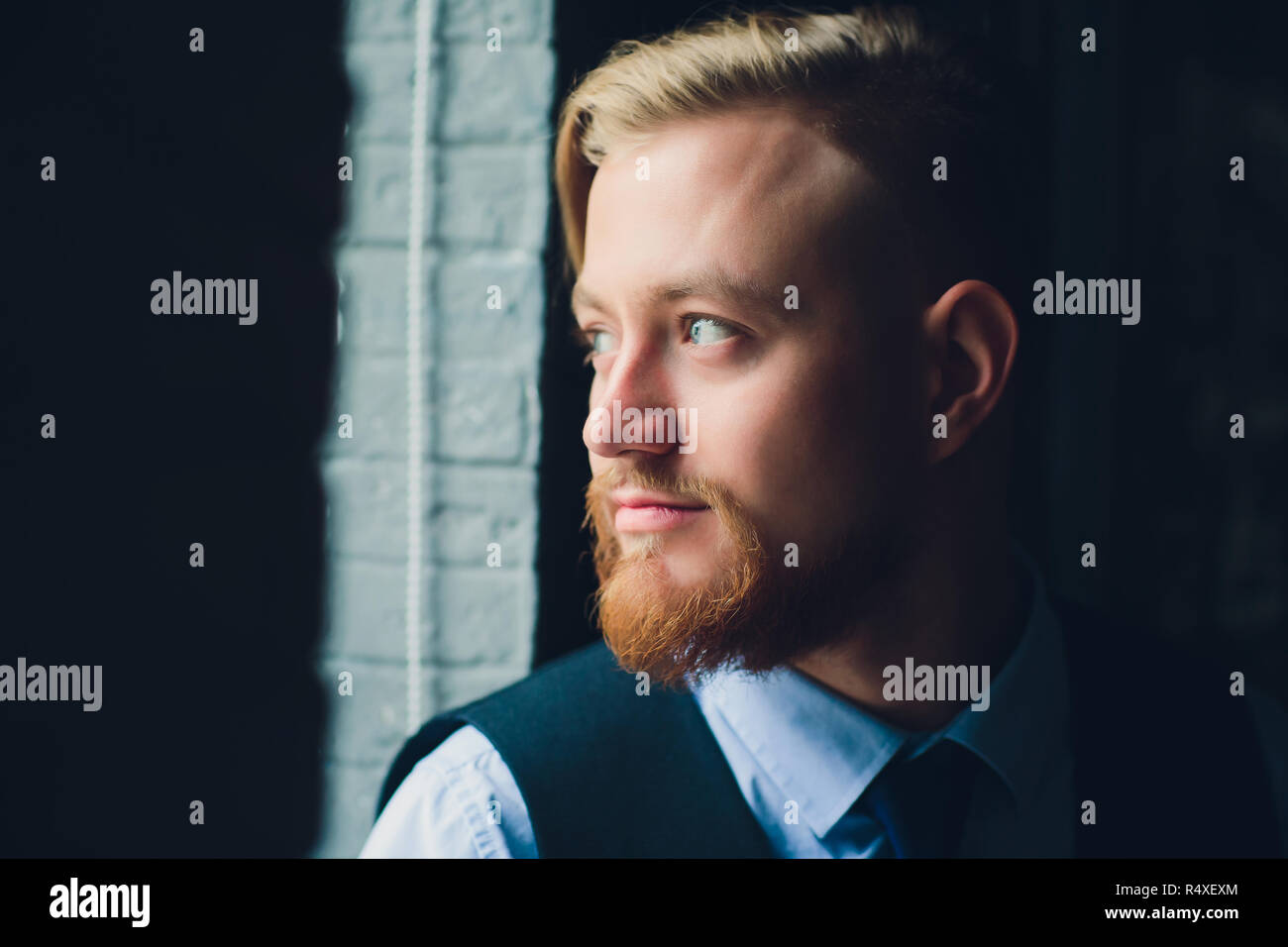 Portrait Of Blonde Young Man With Uncommon Appearance Wears White T Shirt Stock Photo Alamy