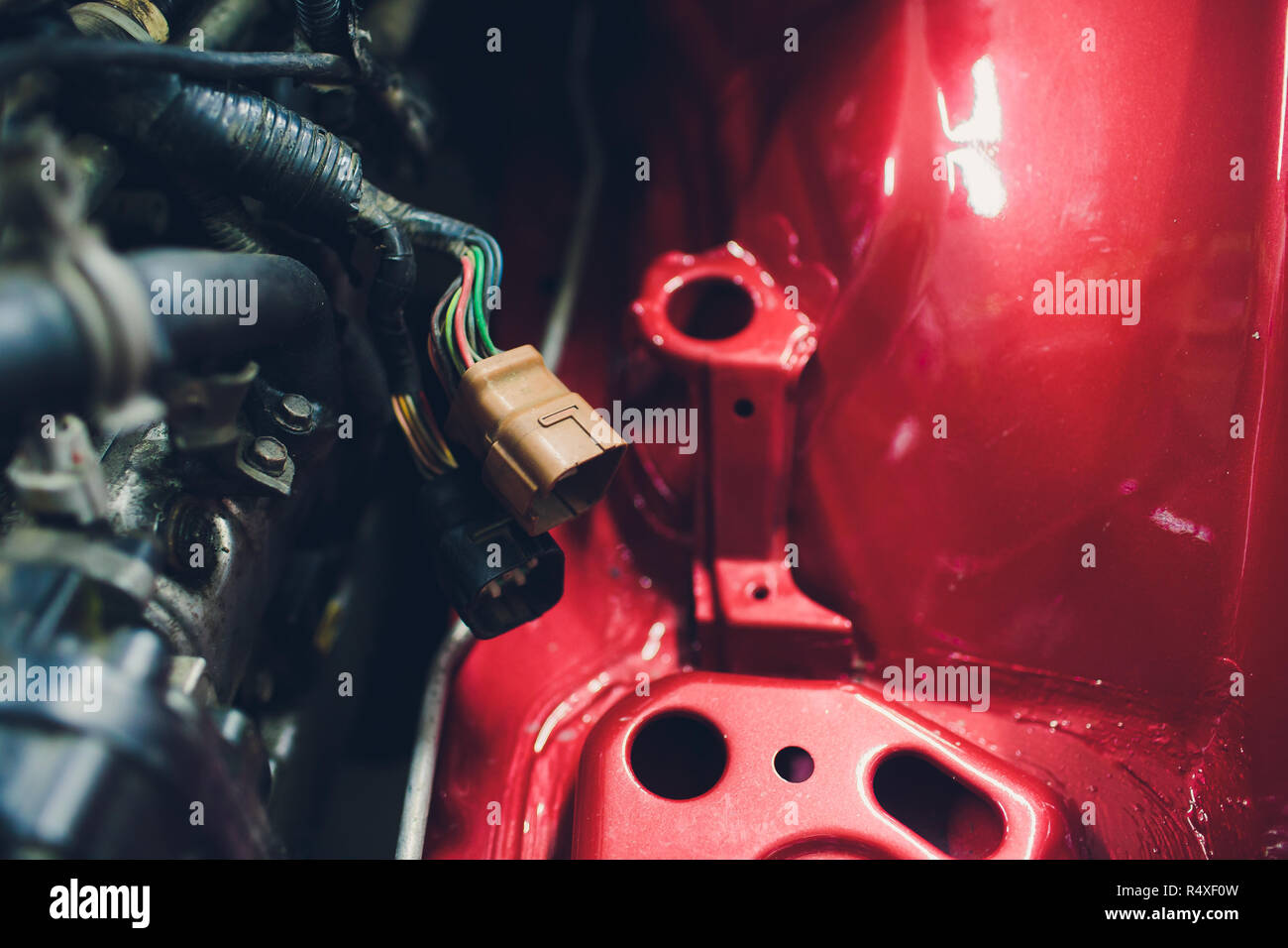 Car with open hood in auto repair shop Stock Photo - Alamy