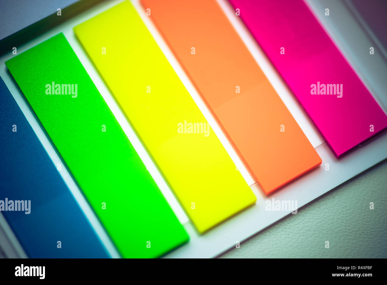 blurred background multicolored notes in a notebook with a white background Stock Photo