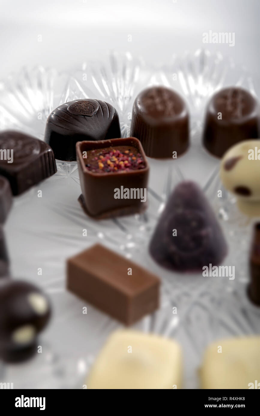 Stuffed chocolates plus flat flavors from above close central detail