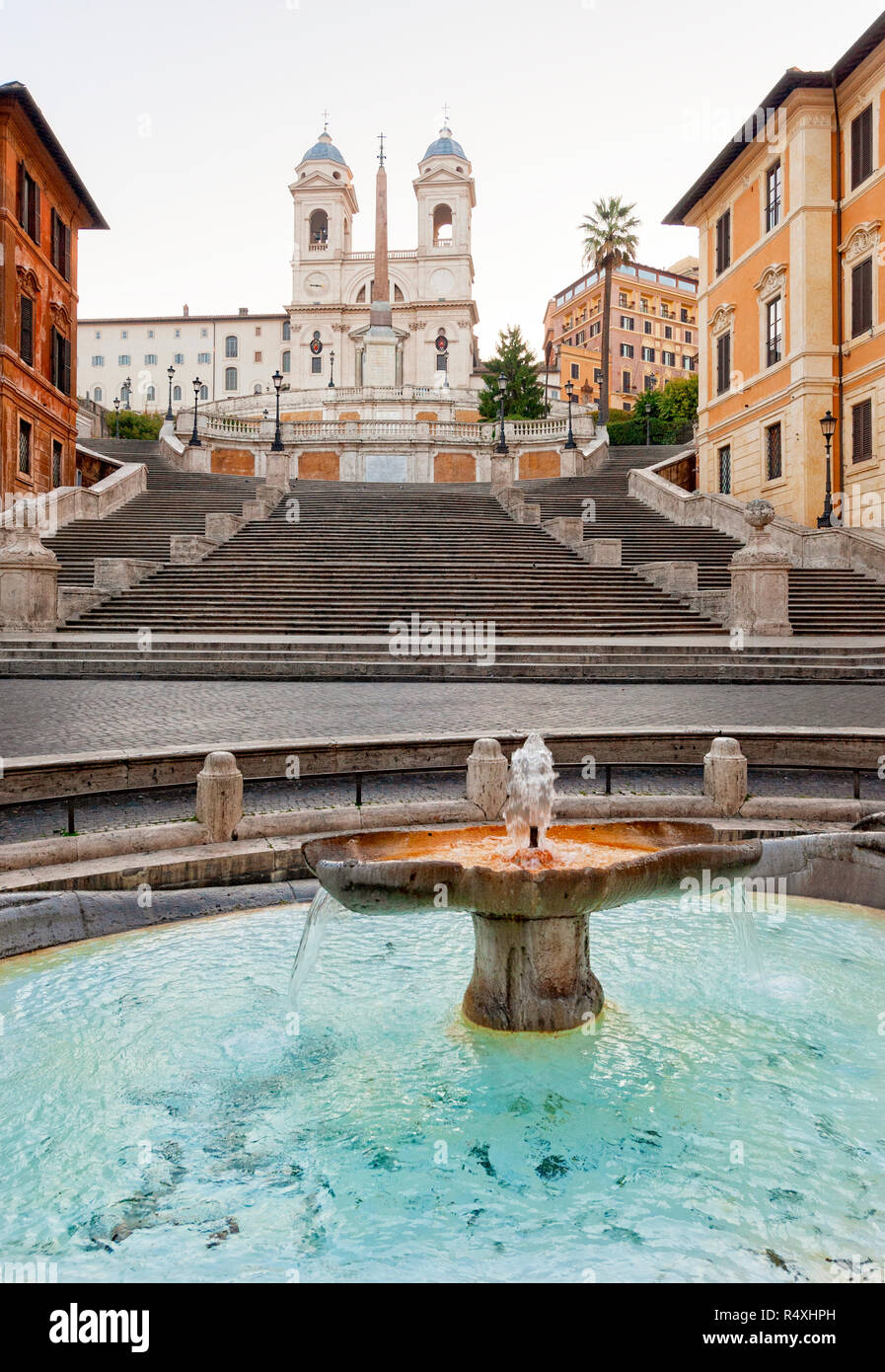 Spanish Steps in Piazza di Spagna and Fontana della Barcaccia and church of Trinità dei Monti beyond Stock Photo