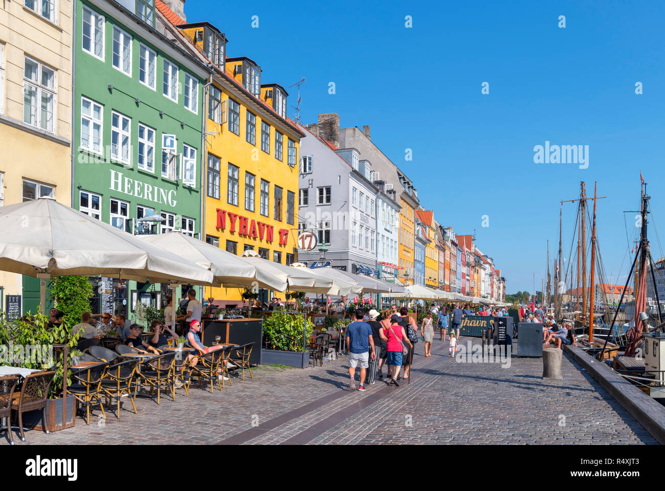 Nyhavn, Copenhagen. Cafes, bars and restaurants along the historic Nyhavn canal, Copenhagen, Denmark Stock Photo