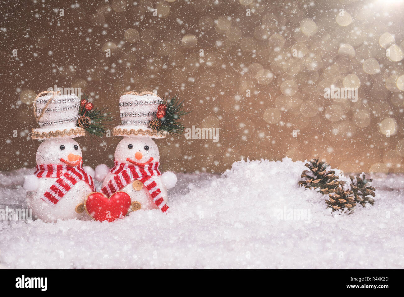 Snowman Couple With Red Heart Christmas Decorations And Snow Merry Christmas And Happy New Year Stock Photo Alamy