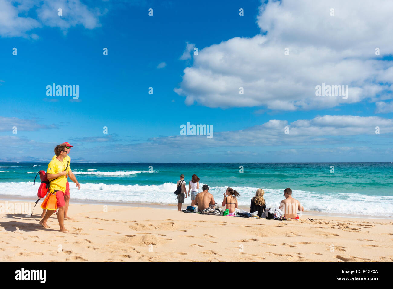 Lifeguards and tourists on El Burro beach at Corralejo on Fuerteventura,  Canary Islands, Spain Stock Photo - Alamy