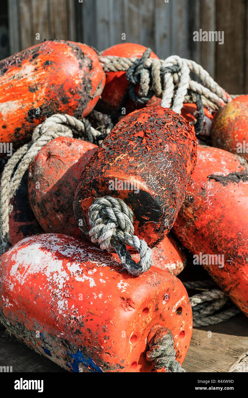 some old lobster pots floats buoys and fishing nets with ropes