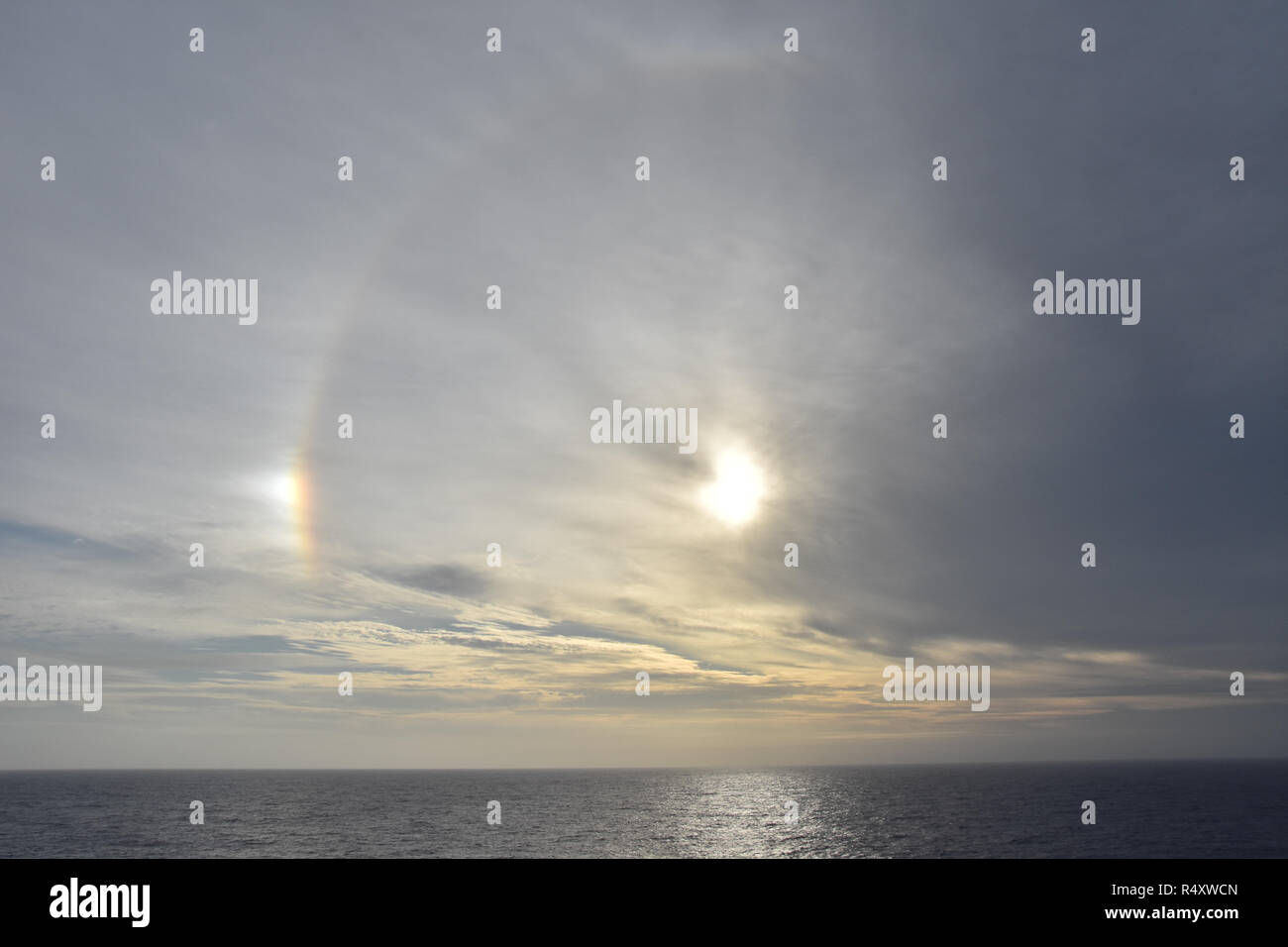 Sun Dog, or parhelion, as seen from the deck of a ship in the Pacific Ocean near Easter Island. Stock Photo