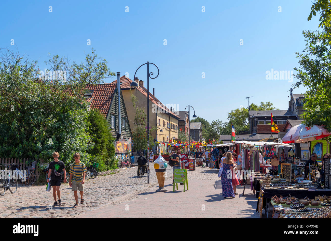 Market stalls on Pusher Street in Freetown Christiania, a commune in Christianshavn, Copenhagen, Denmark Stock Photo