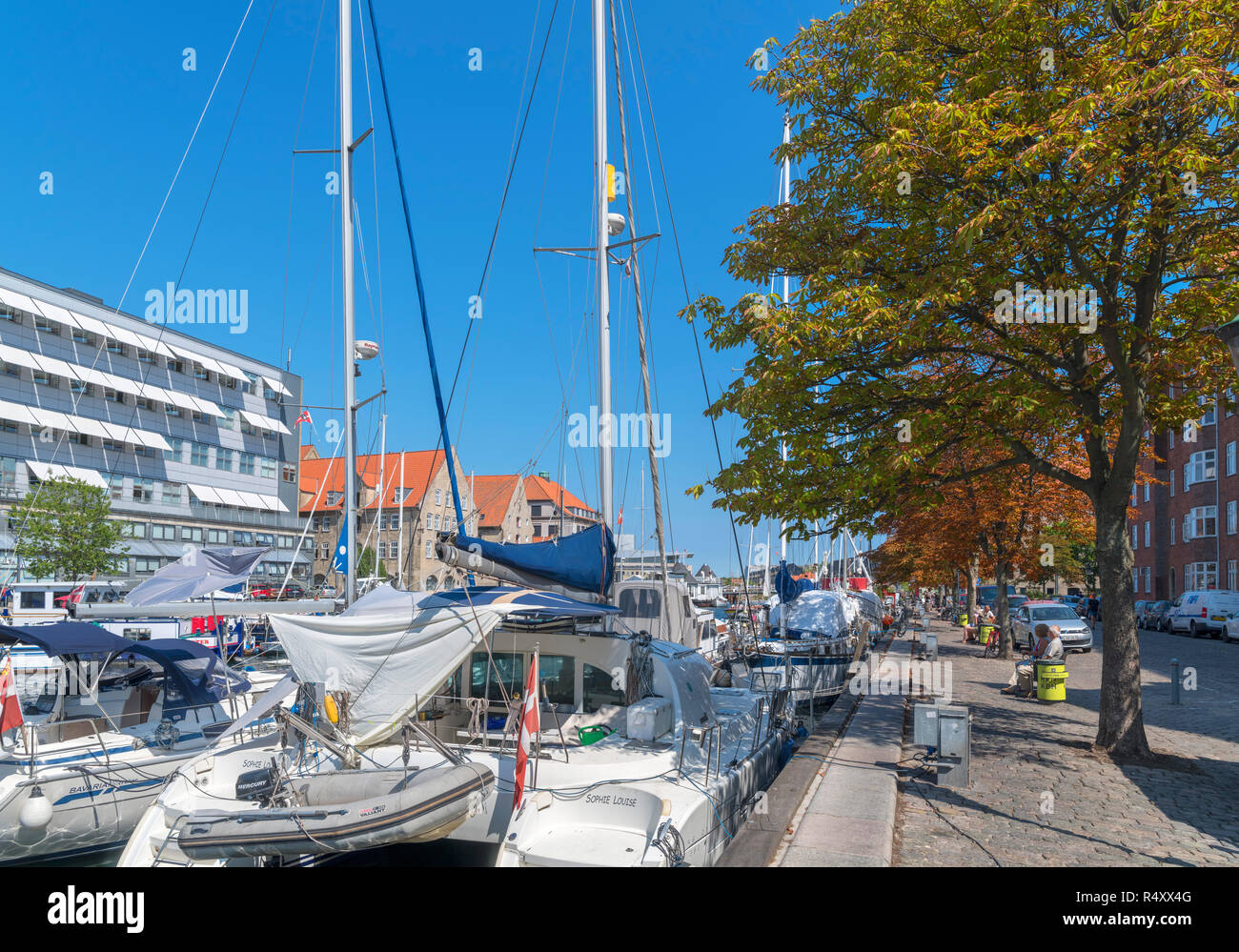 Yachts moored in a canal, Overgaden Oven Vandet, Christianshavn, Copenhagen, Zealand, Denmark Stock Photo
