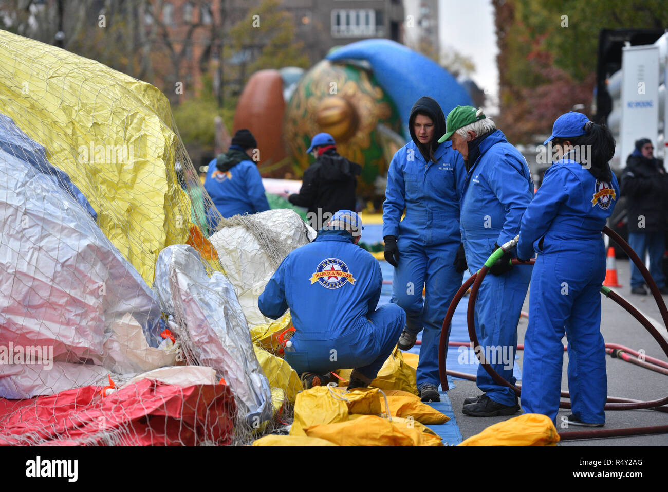 Workers are seen filling parade baloons with helium during the 92nd Annual Macy’s Thanksgiving Day Parade Inflation Eve on November 21, 2018 in New Yo Stock Photo