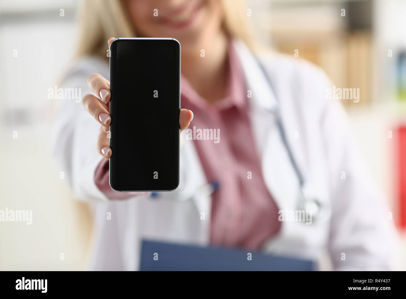Beautiful female blonde doctor hi-res stock photography and images - Alamy