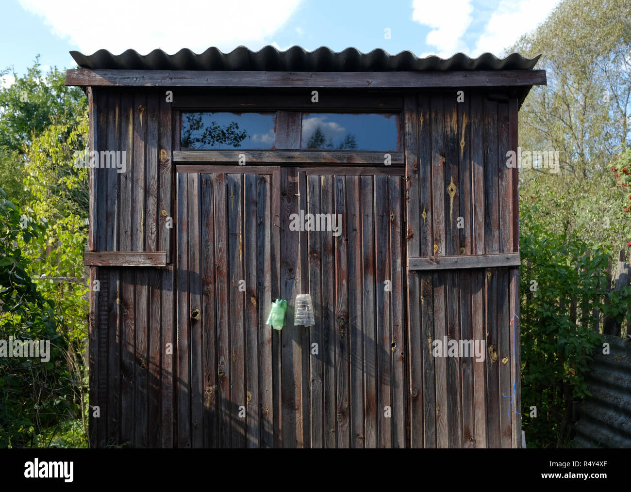 Old wooden accessory dwelling unit on a summer house lot. CloseUp