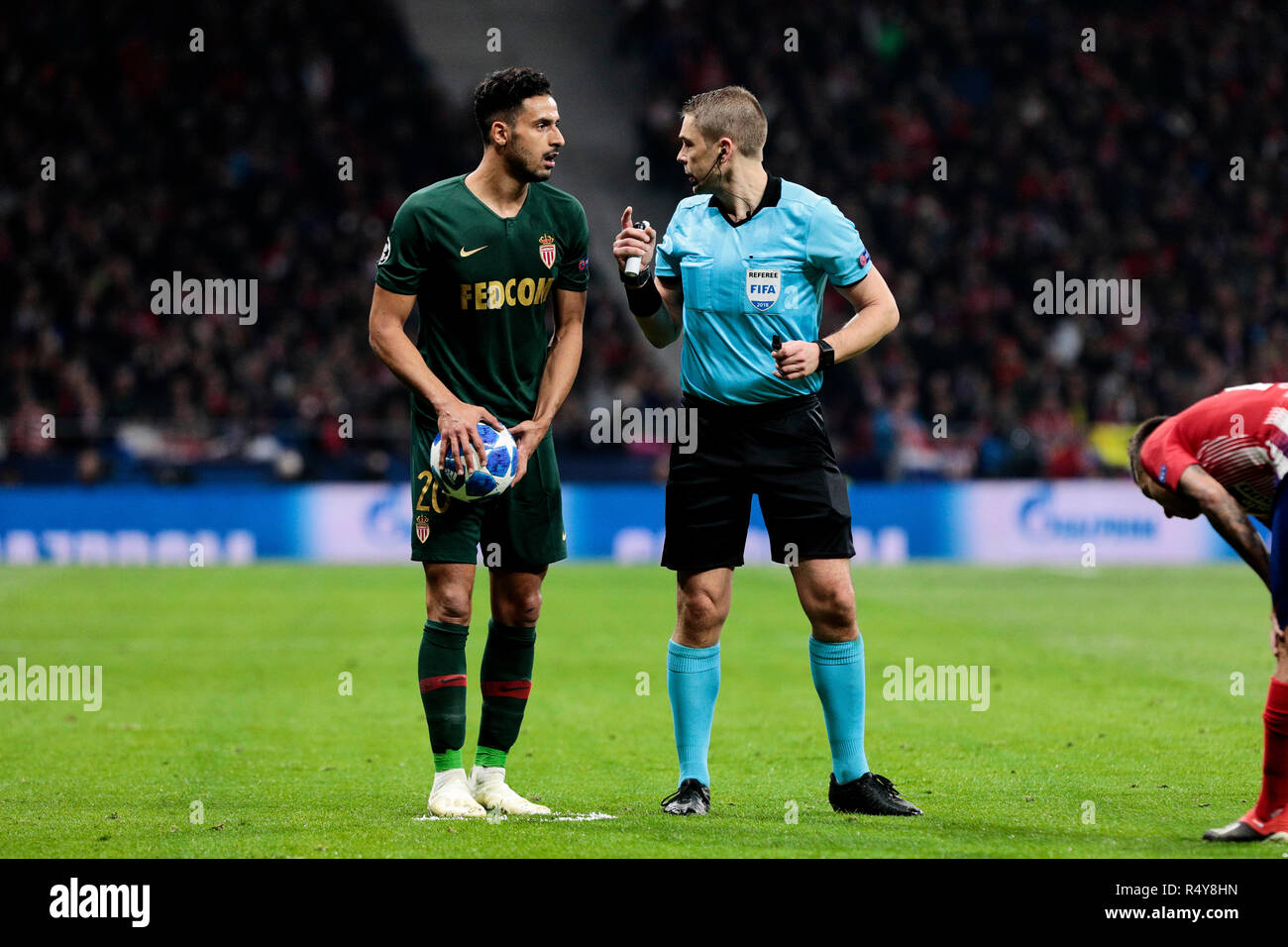AS Monaco's Nacer Chadli seen speaking with a referee Mattias Gestranius during the UEFA Champions League match between Atletico de Madrid and AS Monaco at the Wanda Metropolitano Stadium in Madrid. ( Final score; Atletico Madrid 2:0 AS monaco) Stock Photo