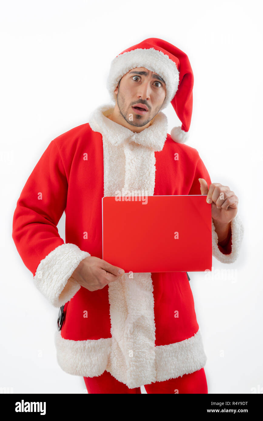 Santa Claus with notebook in his hands Stock Photo