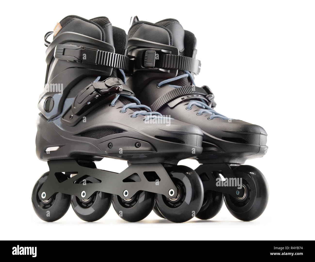 Pair of black inline skates isolated on white Stock Photo Alamy