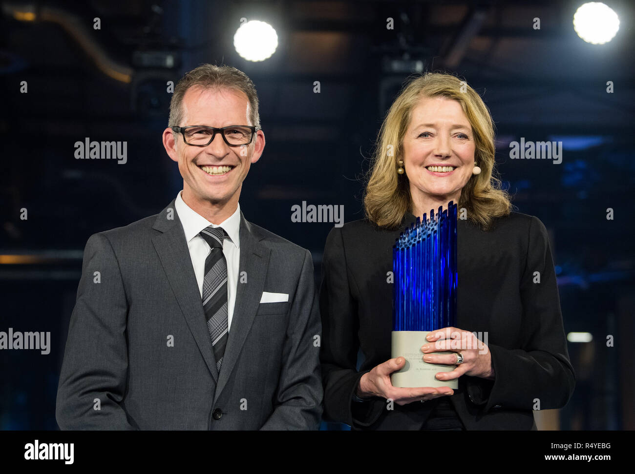 28 November 2018, Berlin: The prizewinners Helga Rübsamen-Schaeff (r) and Holger Zimmermann will be on stage after the award ceremony. The medicine of the company AiCuris Anti-infective Cures (Wuppertal), founded by chemist Rübsamen-Schaeff and today managed by Zimmermann, is intended to protect people from a dangerous virus after bone marrow transplants. Every year, the Federal President awards the German Future Prize to individuals or groups for outstanding technical, engineering or scientific innovation. The award is endowed with 250,000 euros. Photo: Bernd von Jutrczenka/dpa Stock Photo