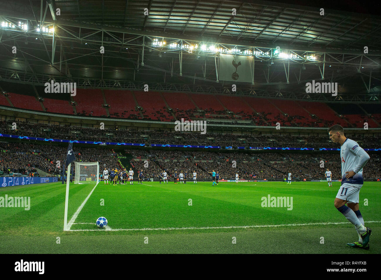 Wembley Stadium, London England. 28th Nov, 2018. UEFA Champions League football, Tottenham Hotspur versus Inter Milan; Erik Lamela of Tottenham Hotspur prepares to take a corner with a mostly empty upper section in the stadium on show Credit: Action Plus Sports/Alamy Live News Stock Photo