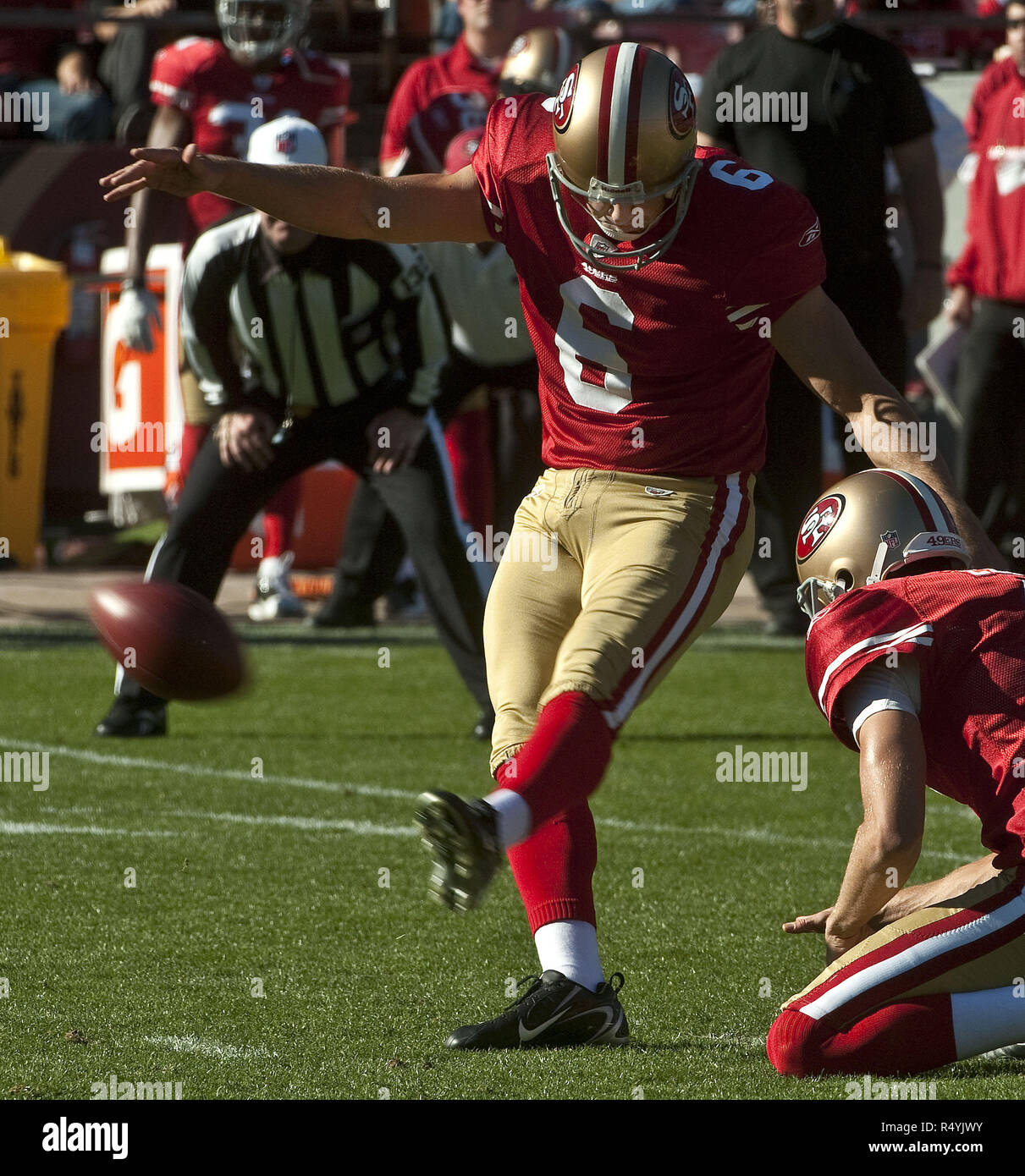 San Francisco, California, USA. 29th Nov, 2009. San Francisco 49ers kicker Joe Nedney #6 makes first point of the day with punter Andy Lee #4 holding on Sunday, November 29, 2009 at Candlestick Park, San Francisco, California. The 49ers defeated the Jaguars 20-3. Credit: Al Golub/ZUMA Wire/Alamy Live News Stock Photo