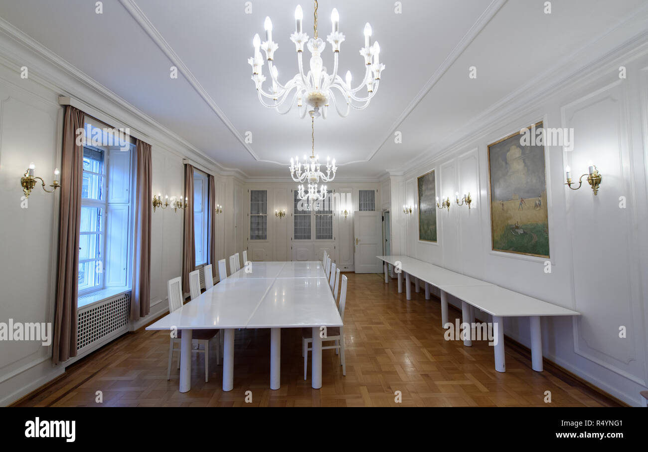 09 November 2018, Bavaria, Pullach: The 'Weißer Saal' conference room can be seen in the presidential villa on the premises of the Federal Intelligence Service (BND). The villa was once the residence of Martin Bormann, head of the party office of the NSDAP and a confidant of Hitler, and belonged to the former Reichssiedlung Rudolf Heß which was built between 1936 and 1938. From 1947, the buildings were used by the Gehlen organization and later by the Federal Intelligence Service (BND). The Federal Intelligence Service has moved from Pullach to its new headquarters in the middle of Berlin. It w Stock Photo
