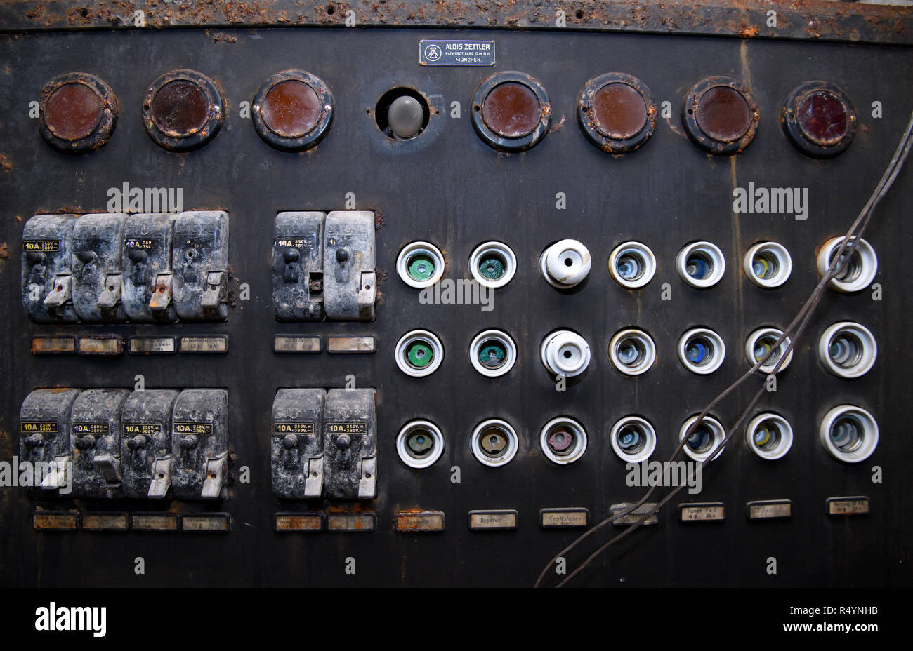 09 November 2018, Bavaria, Pullach: An old fuse box can be seen in a bunker under the presidential villa on the premises of the Federal Intelligence Service (BND). The villa was once the residence of Martin Bormann, head of the party office of the NSDAP and a confidant of Hitler, and belonged to the former Reichssiedlung Rudolf Heß which was built between 1936 and 1938. From 1947, the buildings were used by the Gehlen organization and later by the Federal Intelligence Service (BND). The Federal Intelligence Service has moved from Pullach to its new headquarters in the middle of Berlin. It was Stock Photo