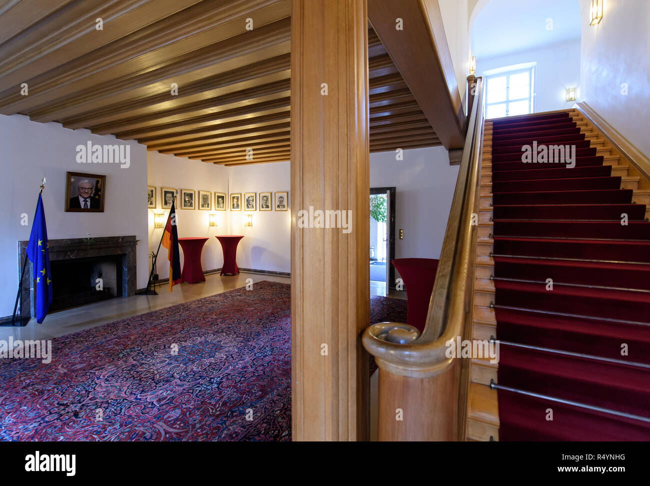 09 November 2018, Bavaria, Pullach: In the fireplace room of the presidential villa on the premises of the Federal Intelligence Service (BND) hang pictures of the Federal President and the former BND bosses. The villa was once the residence of Martin Bormann, head of the party office of the NSDAP and a confidant of Hitler, and belonged to the former Reichssiedlung Rudolf Heß which was built between 1936 and 1938. From 1947, the buildings were used by the Gehlen organization and later by the Federal Intelligence Service (BND). The Federal Intelligence Service has moved from Pullach to its new h Stock Photo