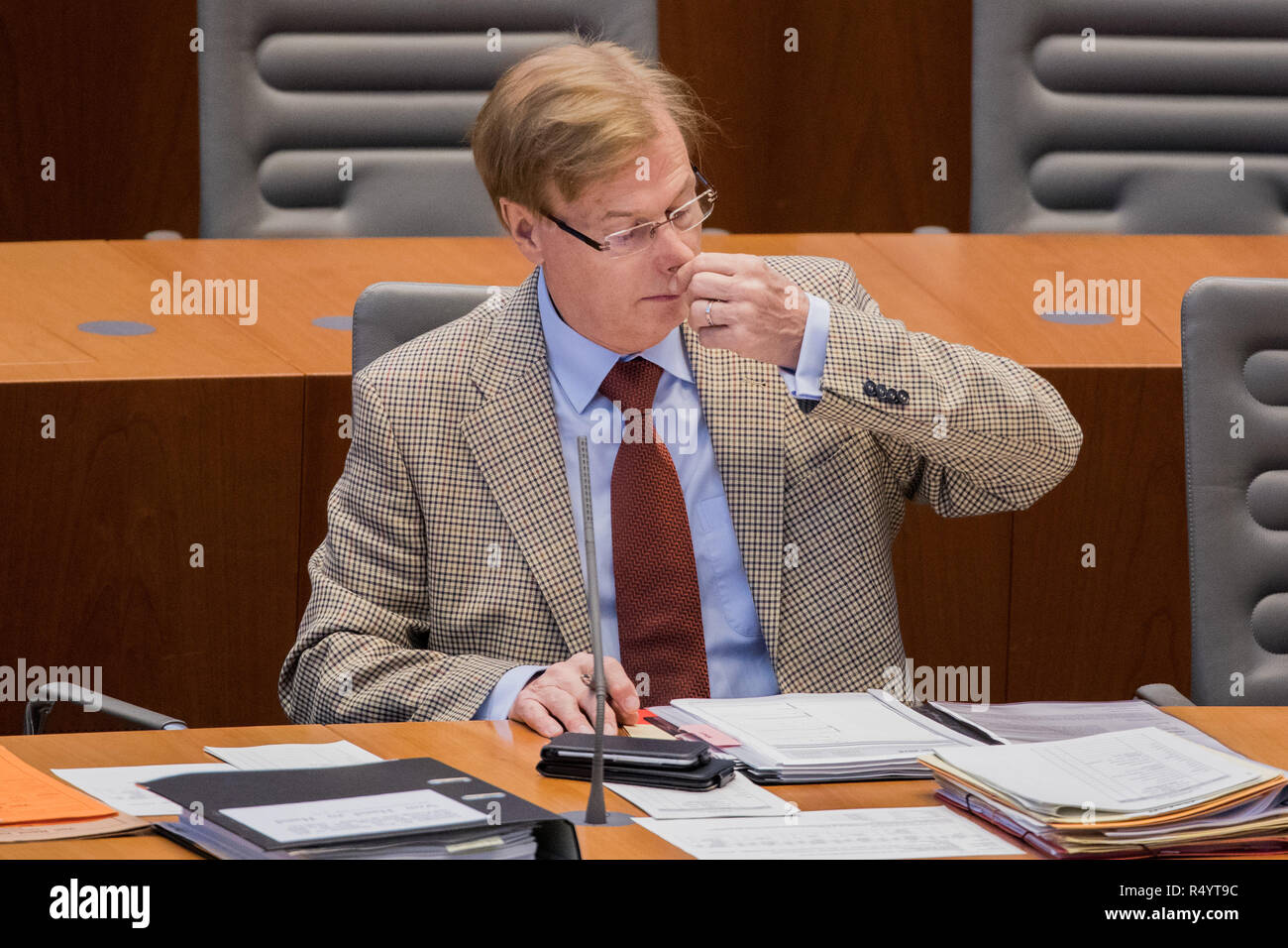 29 November 2018, North Rhine-Westphalia, Düsseldorf: Peter Biesenbach (CDU), Minister of Justice of North Rhine-Westphalia, sits in the plenum of the state parliament. MEPs debate the UK's exit agreement with the EU and the establishment of a committee of inquiry into the death of an innocent Syrian prisoner in the Kleve prison. Photo: Rolf Vennenbernd/dpa Stock Photo