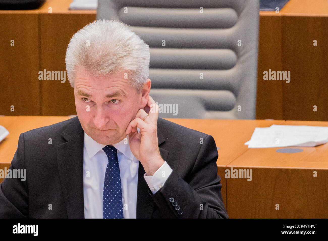 29 November 2018, North Rhine-Westphalia, Düsseldorf: Andreas Pinkwart (FDP), Economics Minister of North Rhine-Westphalia, sits in the plenum of the state parliament. MEPs debate the UK's exit agreement with the EU and the establishment of a committee of inquiry into the death of an innocent Syrian prisoner in the Kleve prison. Photo: Rolf Vennenbernd/dpa Stock Photo
