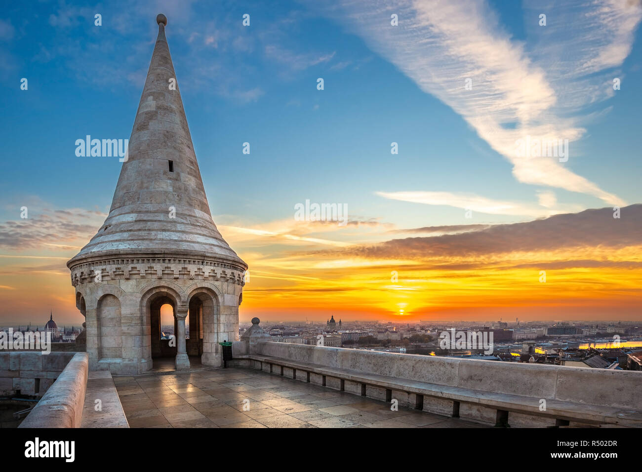 Budapest, Hungary - Beautiful sunrise at the Fisherman's Bastion with skyline view of Budapest including Parliament and St. Stephen's Basilica Stock Photo