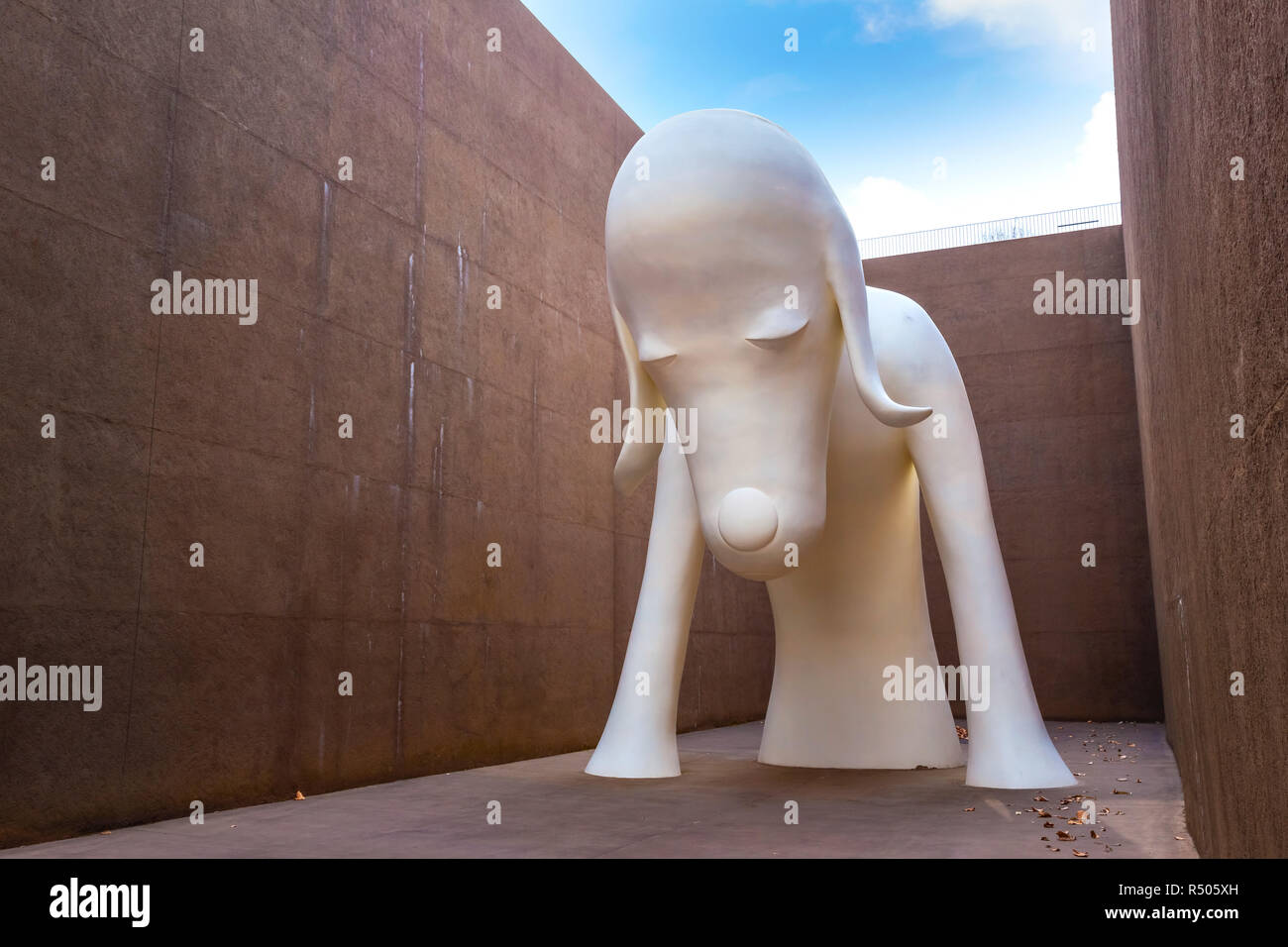 Tokyo, Japan - April 22 2018:  Aomori Dog Statue a gigantic white dog over 8.5 meters tall at The Aomori Museum Stock Photo