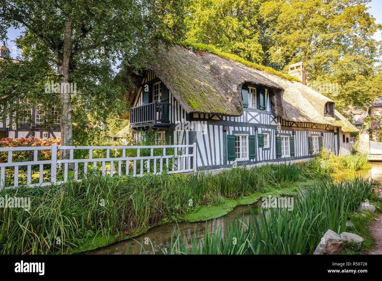 Thatched roof cottage in Veules les Roses France. Stock Photo